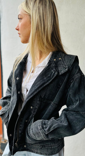 model wears a Faded Black denim jacket with 80s design lapels