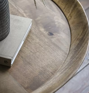 Mango wooden table close up of overhanging tray top.  