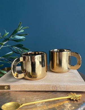 Set Of Two Shiny Gold Mugs