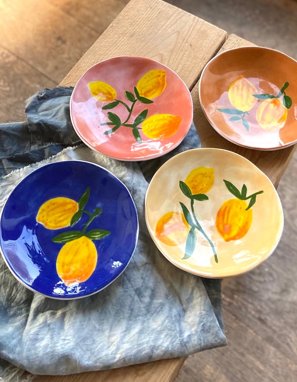 Set Of Four Colourful Lemon Fruit Plates