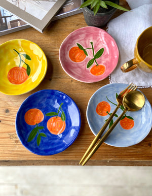 Set Of Four Orange Plates